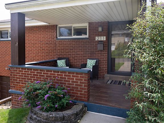 Front Porch with beautiful low-maintenance landscaping