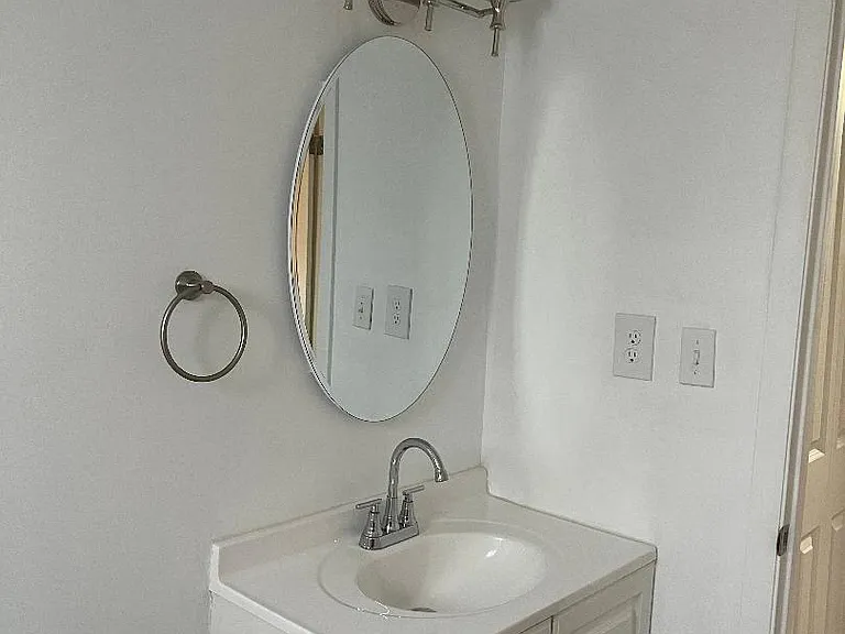 New lighting, medicine cabinet/mirror and vanity.