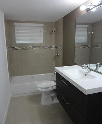 3rd image of 9971 W Bay Harbor Dr APT 107