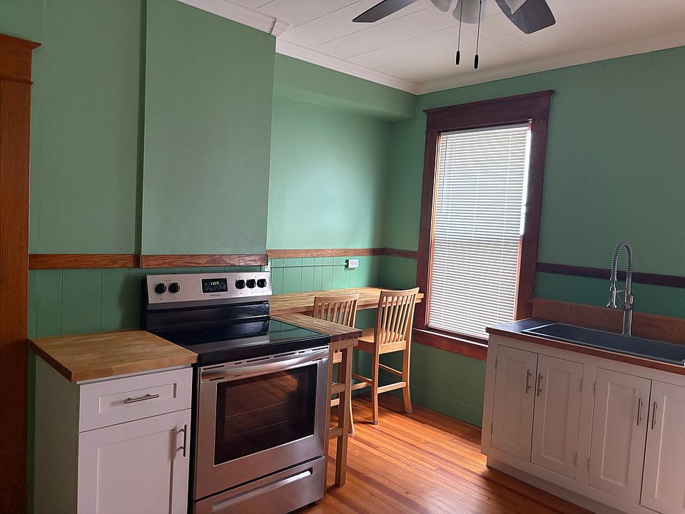 Updated Kitchen with New Cabinets and newer Stove.