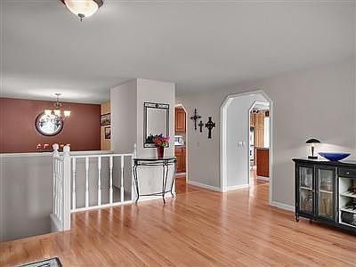 Gleaming hardwoods, clean crisp white molding, warm color, this home is so inviting!