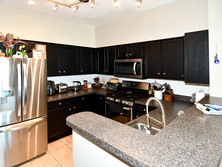 5121 Travis Edward Way #J — Photo 9