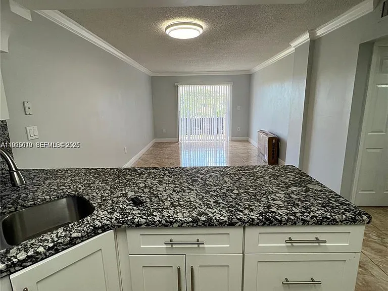 1075 W 68th St #218 — Photo 2