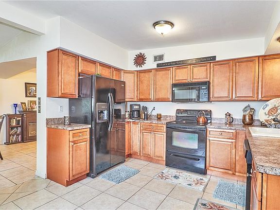 4th image of 6710 Kingswood Dr N