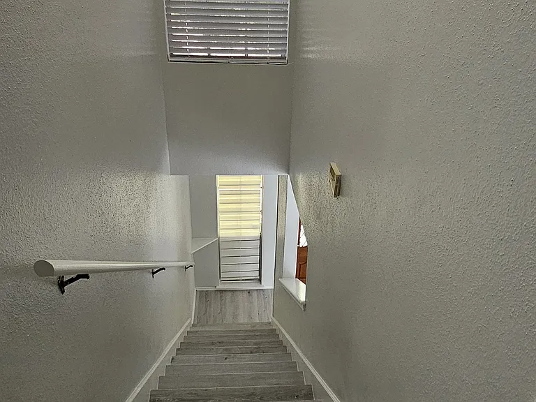 7.Staircase-down finished in thick solid wood, Upstairs landing and hallway in rich wood flooring