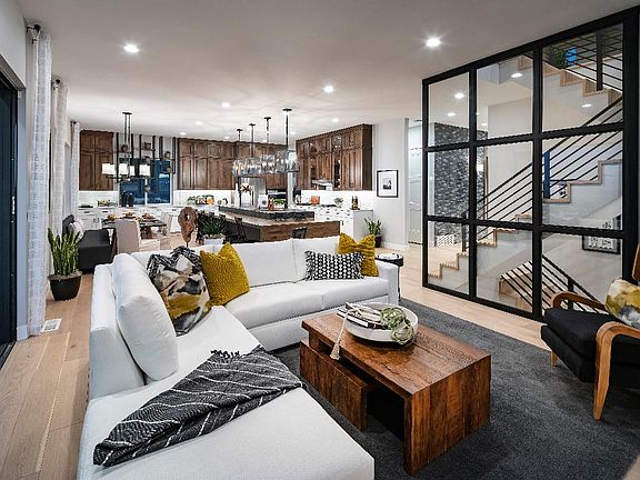 Open concept great room with multi-slide pocket door
