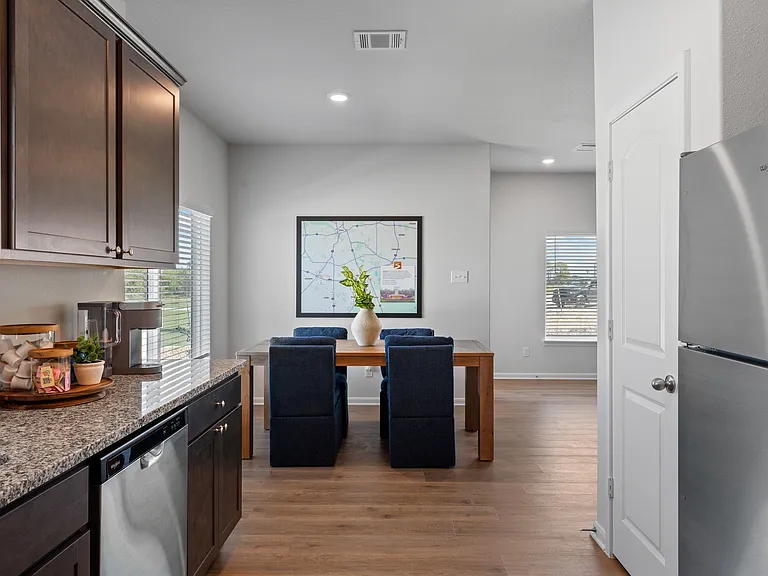 The dining room sits right off of the kitchen.
