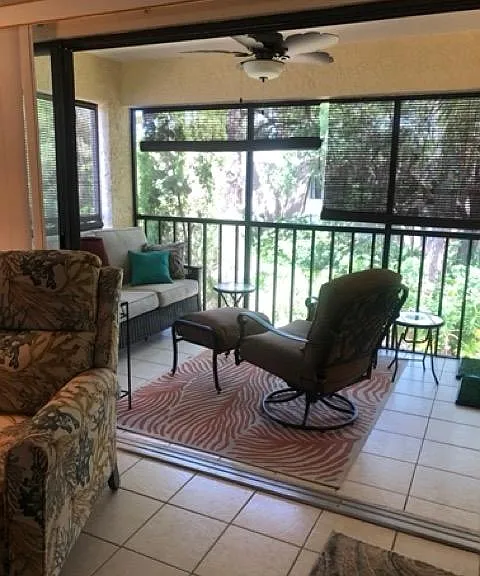 Screened lanai with ceiling fan and light