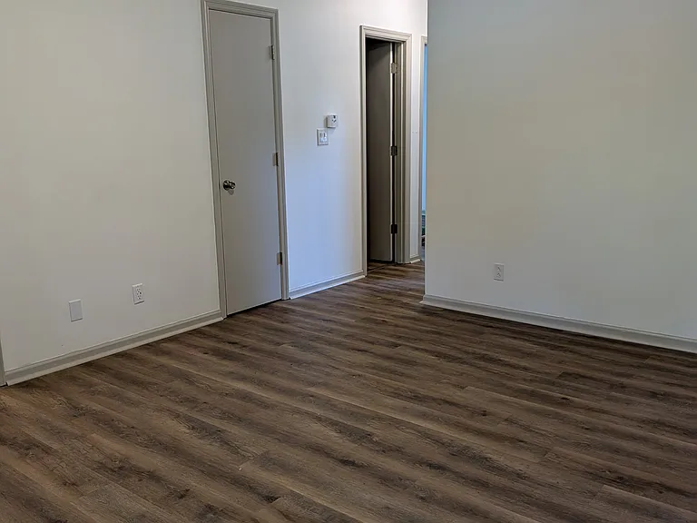 Living room (closet, bathroom doorway)
