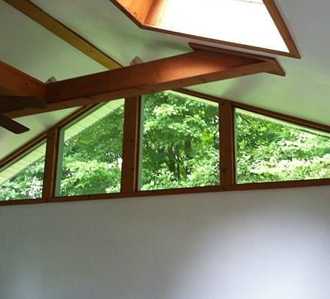 Sunshine enters thru cathedral ceiling of fabulous main level ad