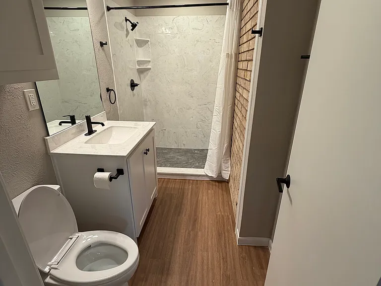 Bath 5 is shared by Study Butte and Big Bend and is located next to the laundry room.
