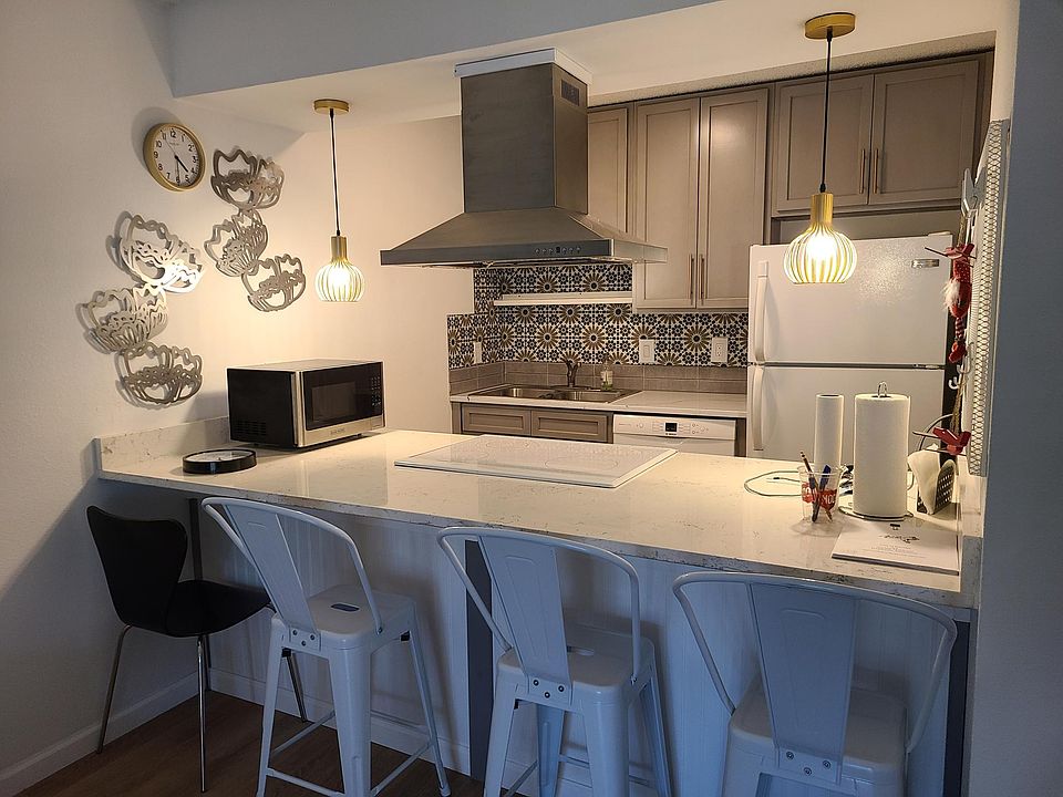 Fully remodeled with Quartz countertops, new tile, new cabinets, paint, decor