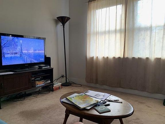 Spacious Living Room (carpeting has been removed).