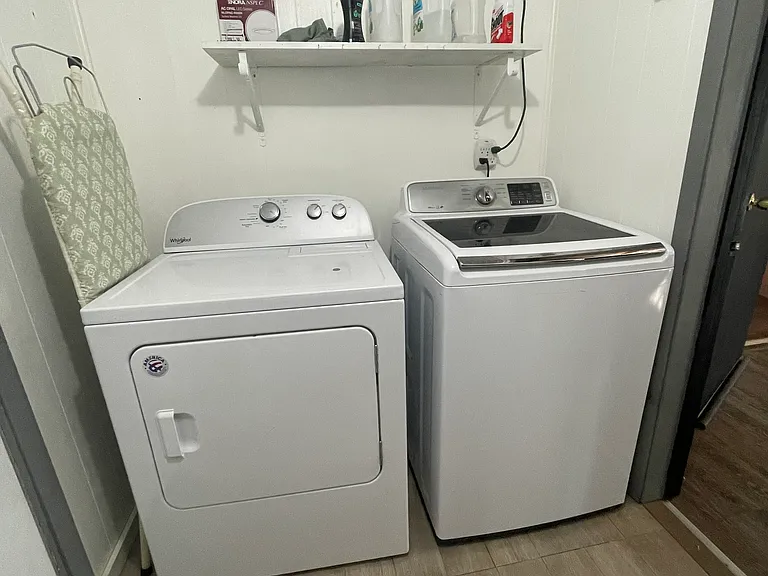 Shared laundry with one neighboring cottage
