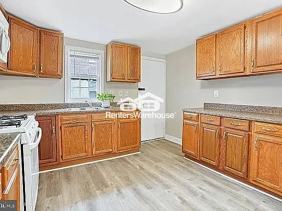 2704 Wilkens Ave — Photo 2