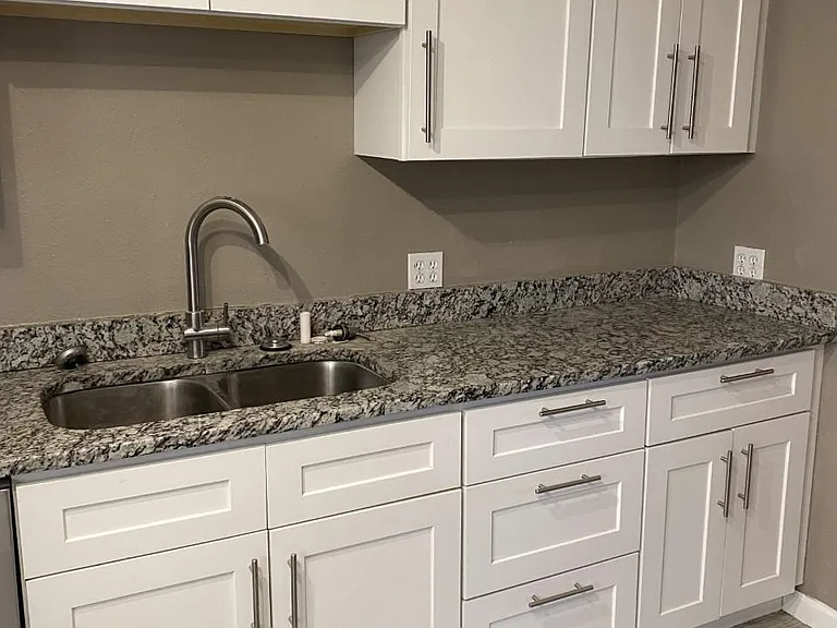 4 of the 5 drawers, double sink