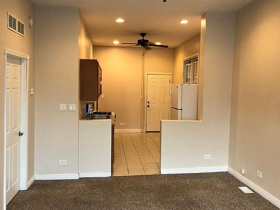 Living room floors are no longer carpet, but laminate flooring instead.