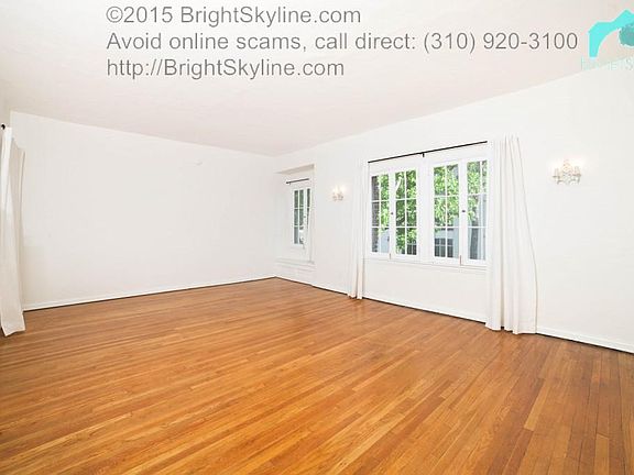 Living Room with lots of windows (photos are from similar vacant apartment in the building).