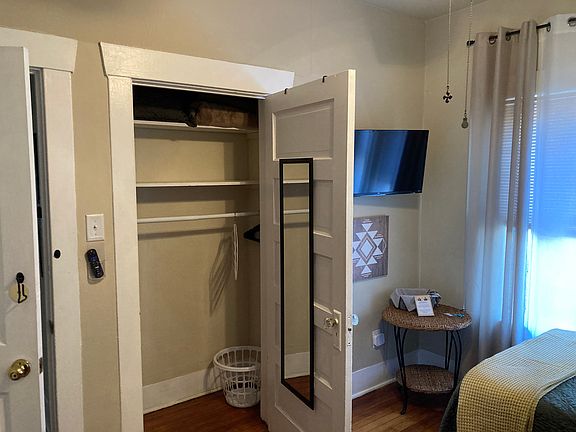 Closet, Roku television, wall of windows