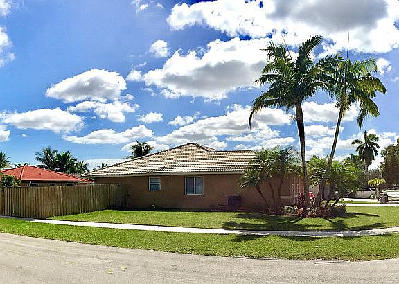 1/4 acre corner lot with a 10' side entry gate for easy access to back yard