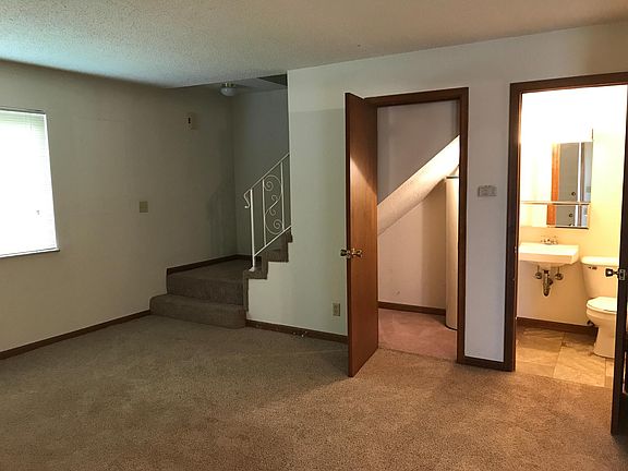 Living room (with half bath and storage closet)