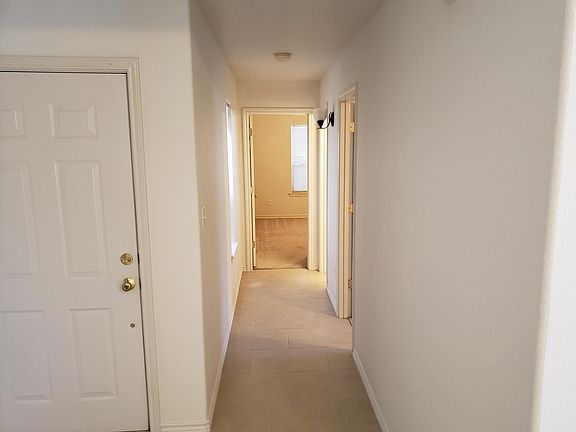 Entry, hall to front bedroom, bath, middle bedroom