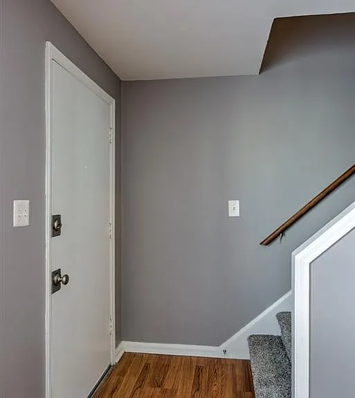Front entrance and staircase in a unit at Colonial Park.