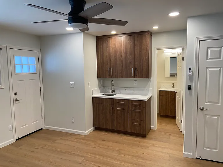 Kitchenette and entrance to bathroom
