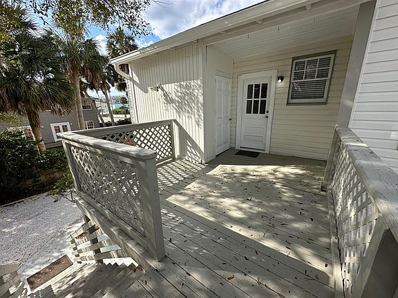 Private deck on the back of the property with entrance