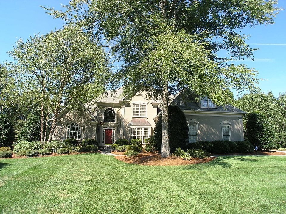 Beautifully landscaped front view of home