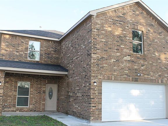 Picture yourself relaxing on this front porch or enjoying great views from the large dining room window.