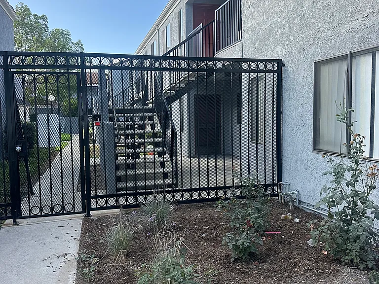 Citrus Court Apartment has four buildings. This building is a two-bedroom two bath apartment. Small gate for entry and exit.