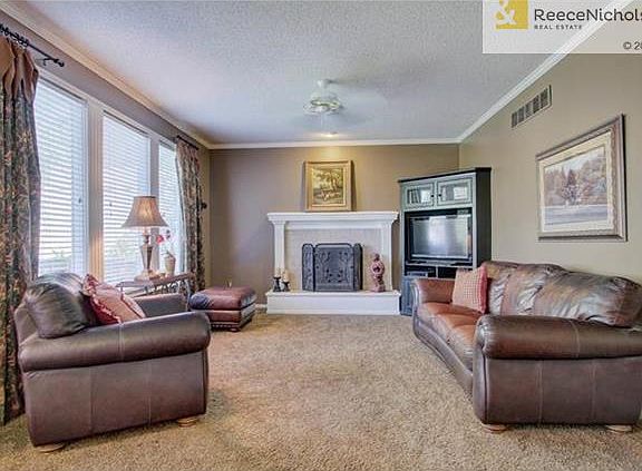 Great room opens to kitchen and breakfast room.