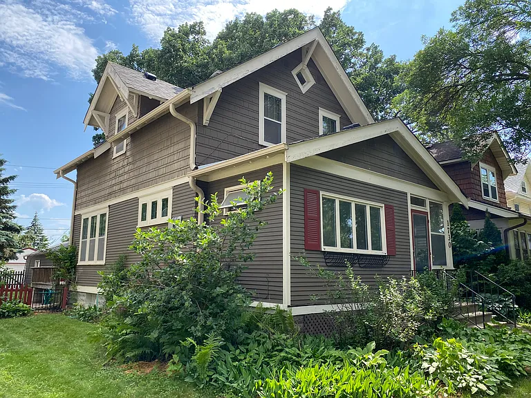 This home is surrounded by mature gardens and is well-maintained!