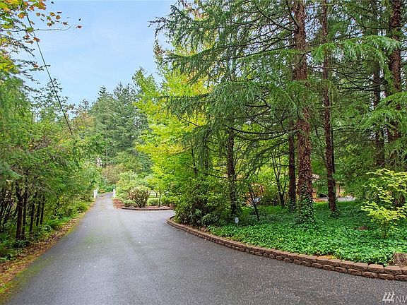 Meticulously maintained estate like driveway leading to your new home