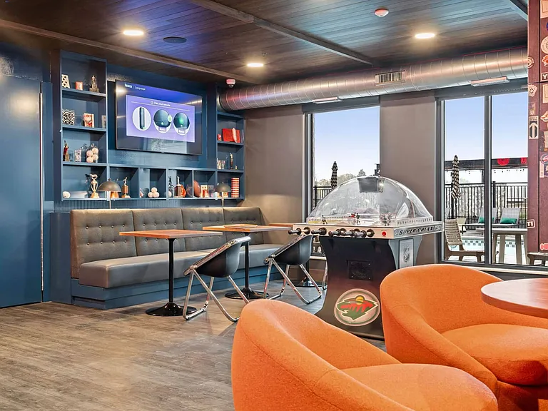 Table & Booth Seating with Free Games at Harley's Residents Only Speakeasy at The Hallon Luxury Apartments in Hopkins MN | apartments near St Louis Park MN