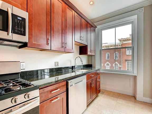 Kitchen full sized brand new appliances and gas stove