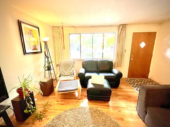 Spacious living room with east facing window (unit is for rent unfurnished).