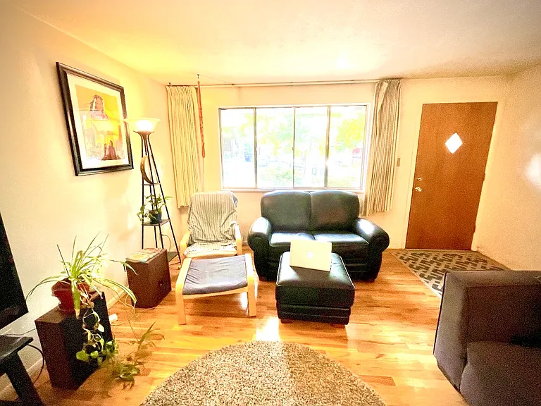 Spacious living room with east facing window (unit is for rent unfurnished).