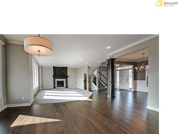 Great Room with oversized gas direct vent sealed until fireplace. Pre-wired for 5-speaker surround sound, security and HDMI under 10'.