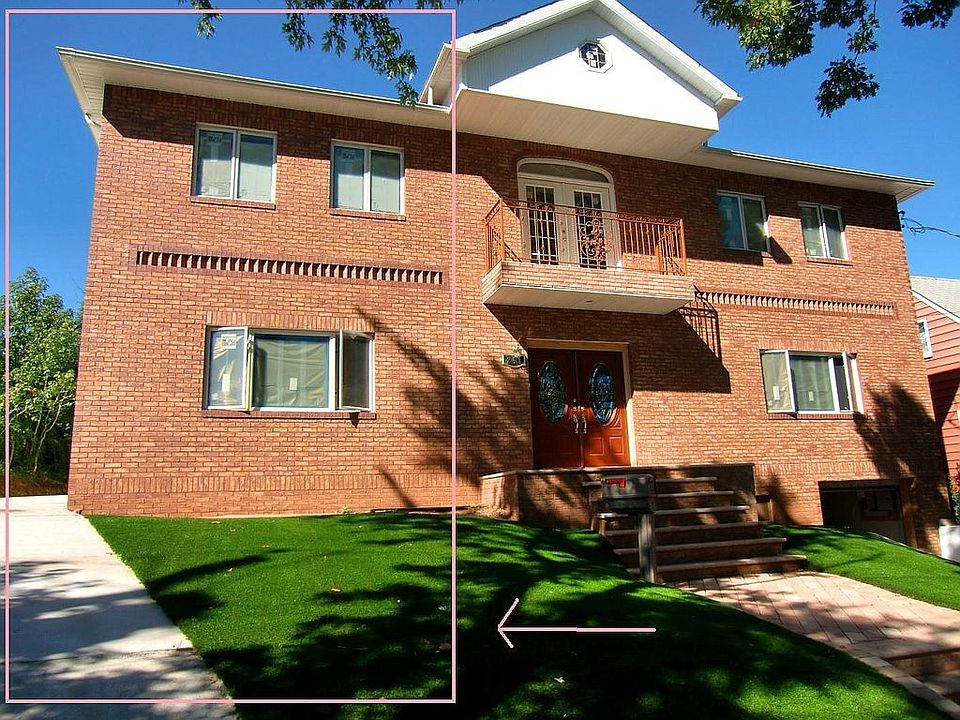 Front of house + side apt.