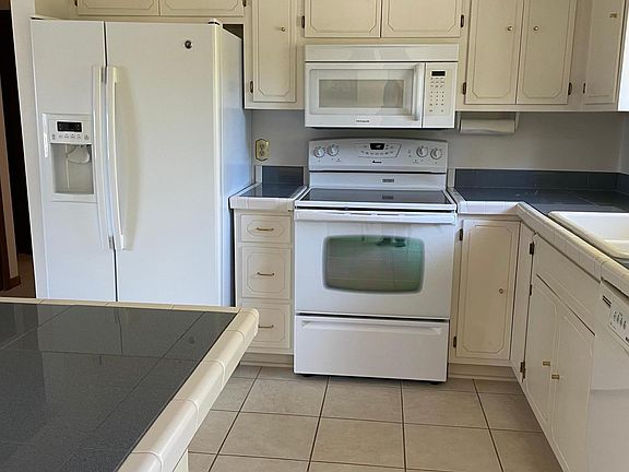 5th image of 7648 Morgan Ave N