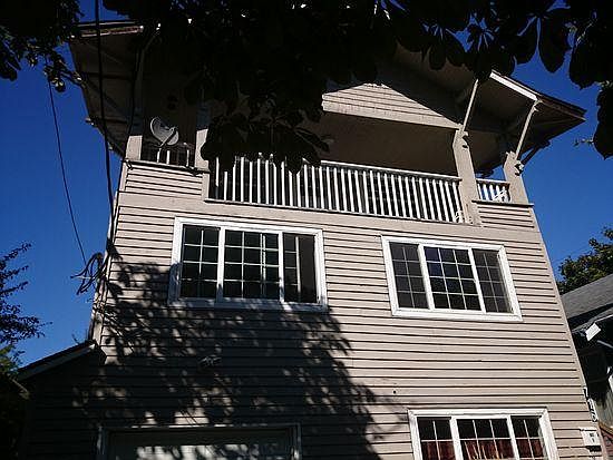 Unit A is the top 2 floors. Includes enclosed porch