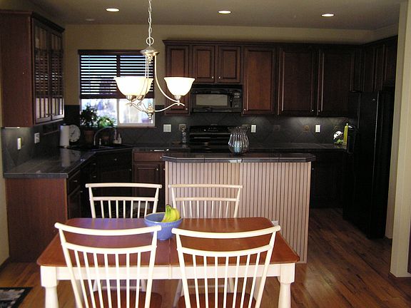 Eat-In Kitchen with Hardwood Floors.