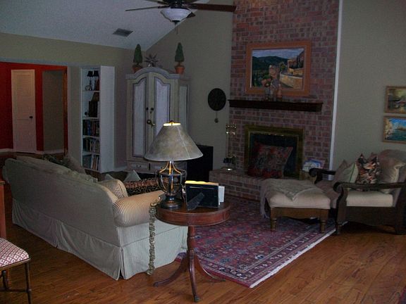 Living room with wood buring fireplace