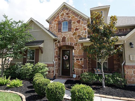 Pretty stone and stucco elevation.