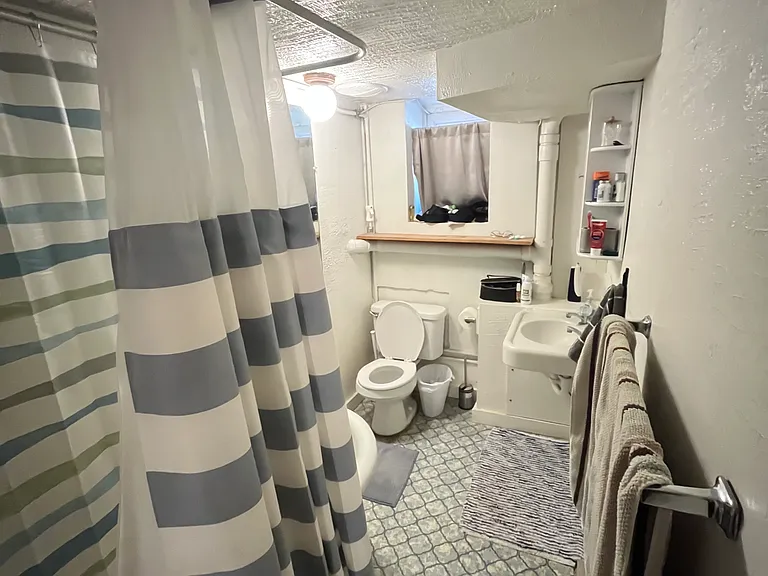 Bathroom with claw foot tub.