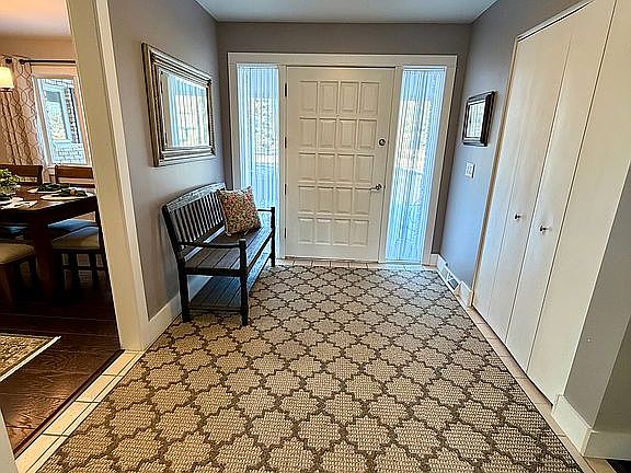Foyer with large coat closet