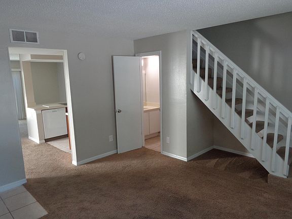 Half bath and Kitchen from living room.