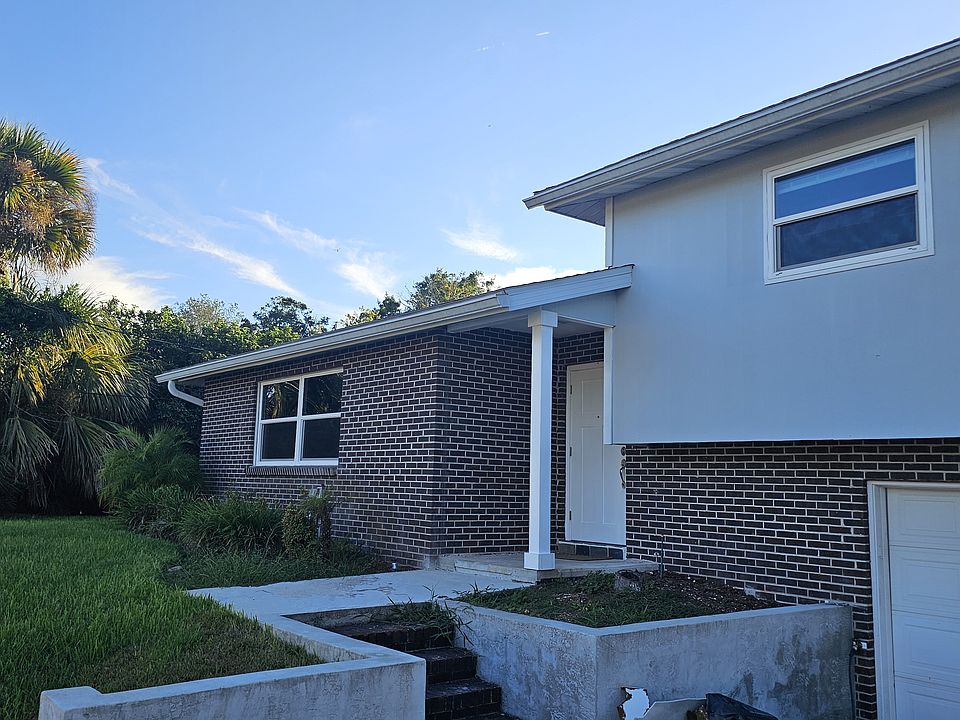 Welcome Home! Walkway, covered front porch, and room to personalize the planter bed.